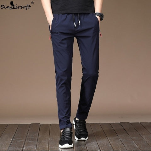 Men's Autumn Casual Sport Pants Men Elastic Nine Pants Small Feet Joggers Pants Drawstring Beam Pants Versatile Trousers Homme